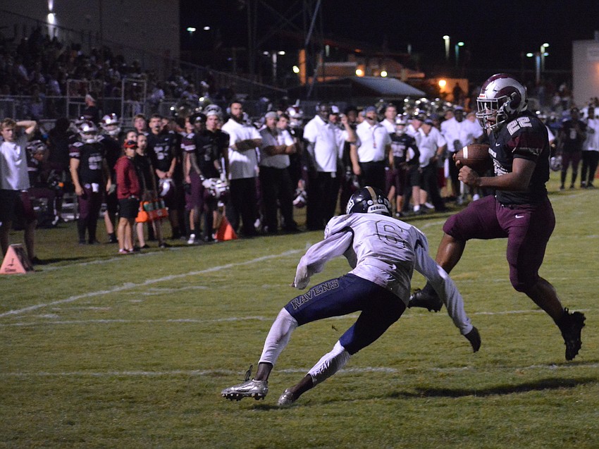 Senior running back Ali Boyce leaps an Alonso defender in the red zone. Boyce had four touchdowns against the Ravens.