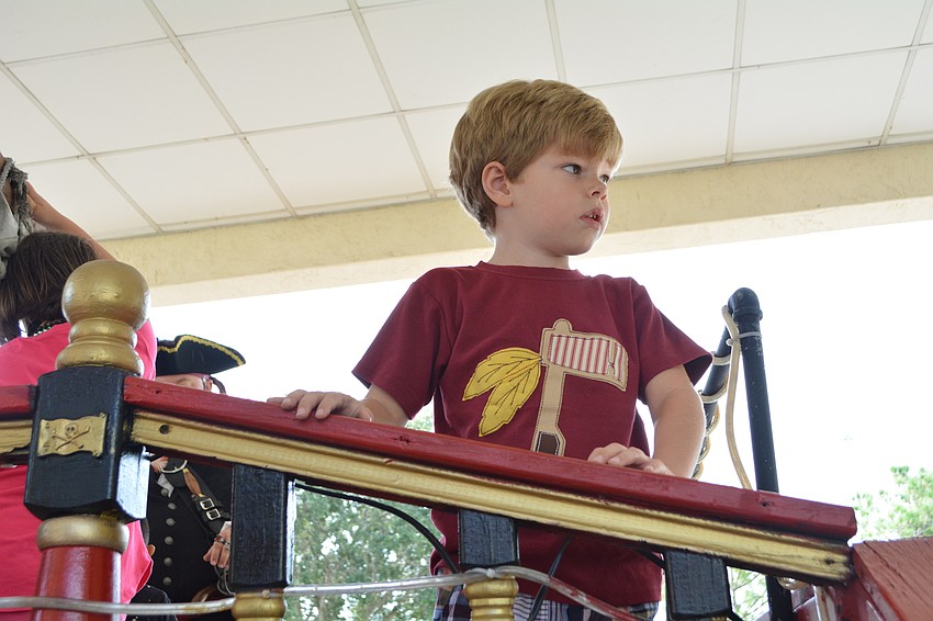 From the deck of the ship, River Club's Braxton Miller, 5, asks if there's a plank to walk.