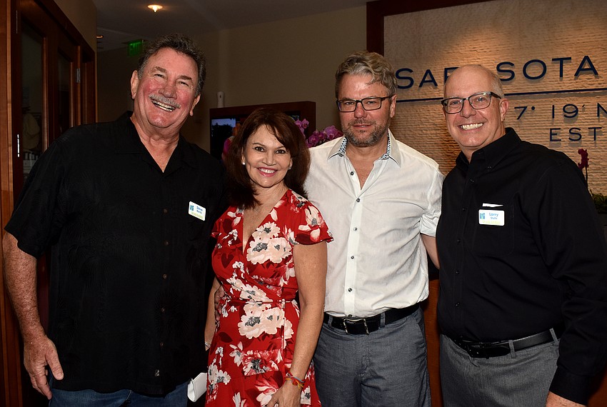 Sarasota Bay Watch Board Member Steve Martin, Esther Visuna, Jeffrey Schaefer of event sponsor Ace Hardware and Sarasota Bay Watch President Larry Stults