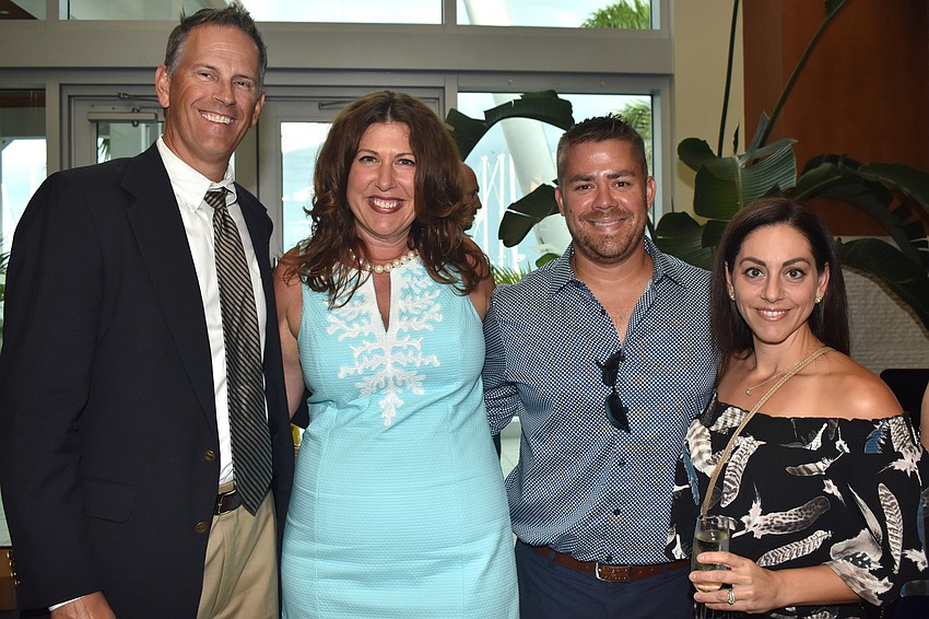 Robert and Denise Pope and Nick and Samantha Dzembo