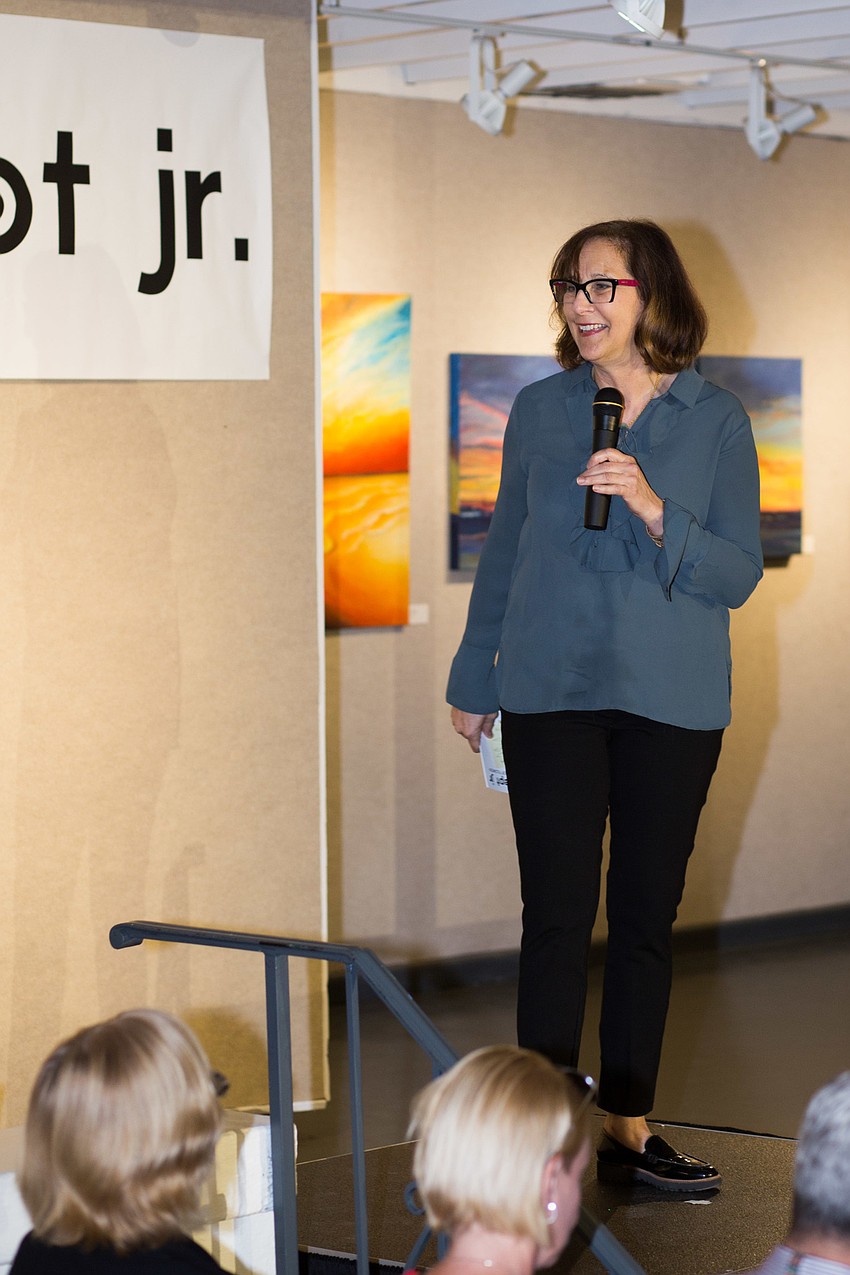 Executive Director Lisa Berger welcomes guests to iConcept Jr.