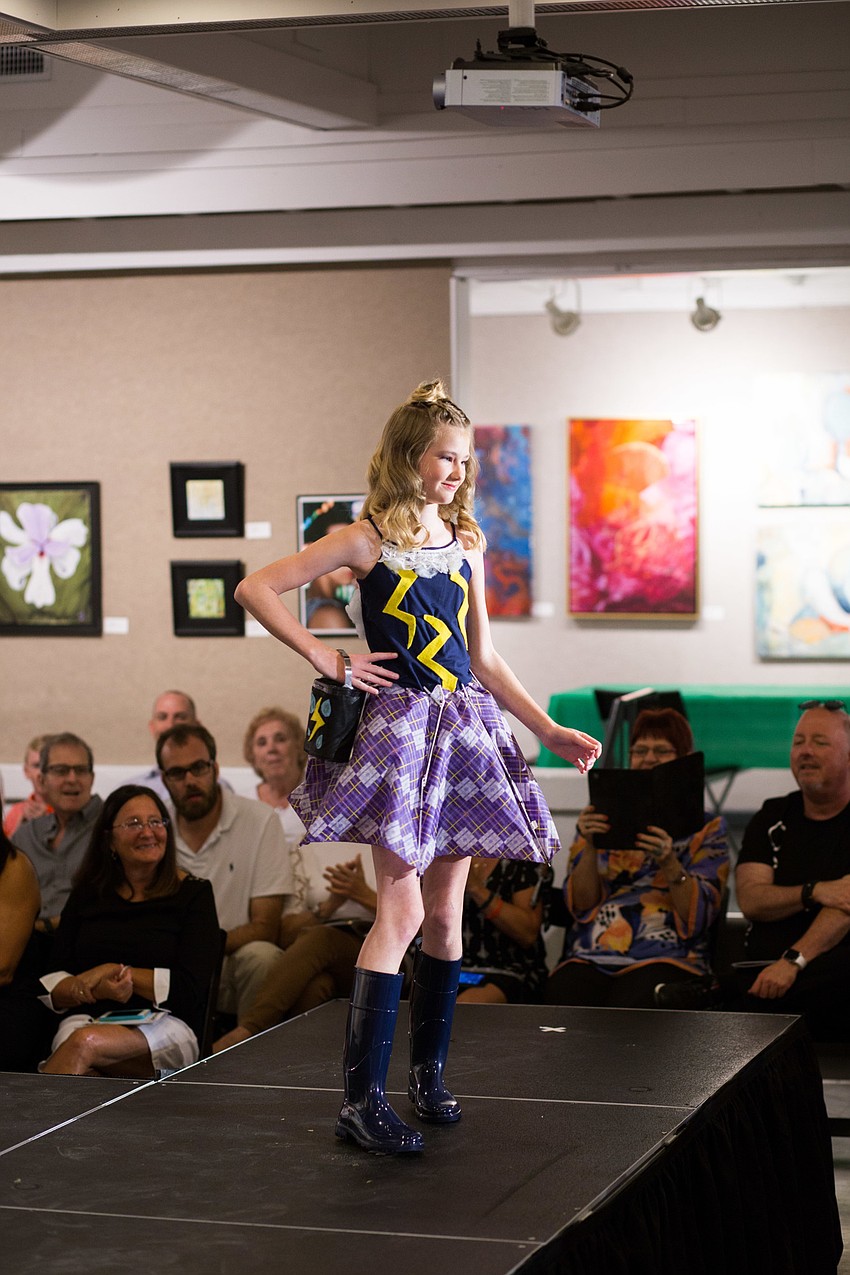 Eden Hurly walks the runway in her design, 