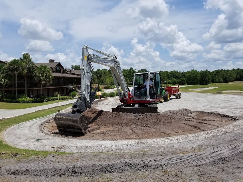Work continues during the improvement project on the practice green.