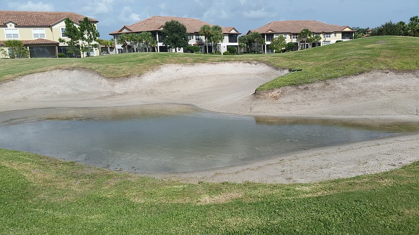 A sand trap before Kevin Paschall and Jon Whittemore took over in 2015. The owners added drainage so water wouldn't accumulate in the trap.