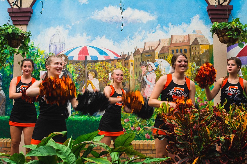 SHS cheerleaders got guests excited as they arrived.