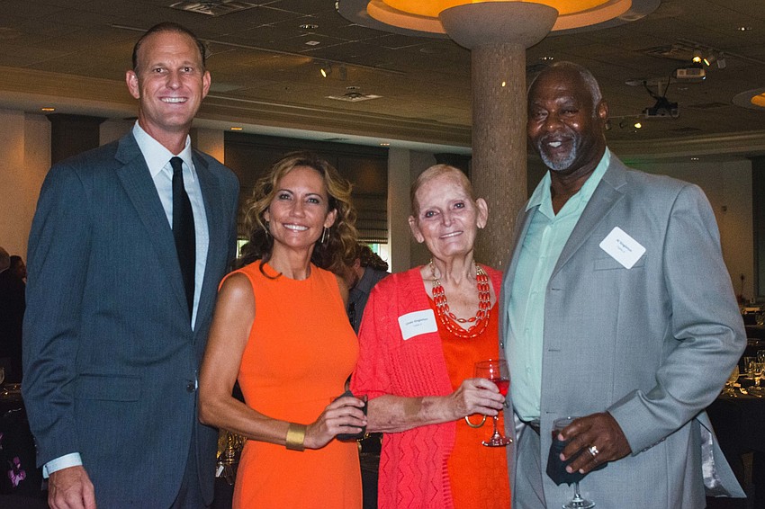 Matt and Ellen Drews with Linda and Al Singleton
