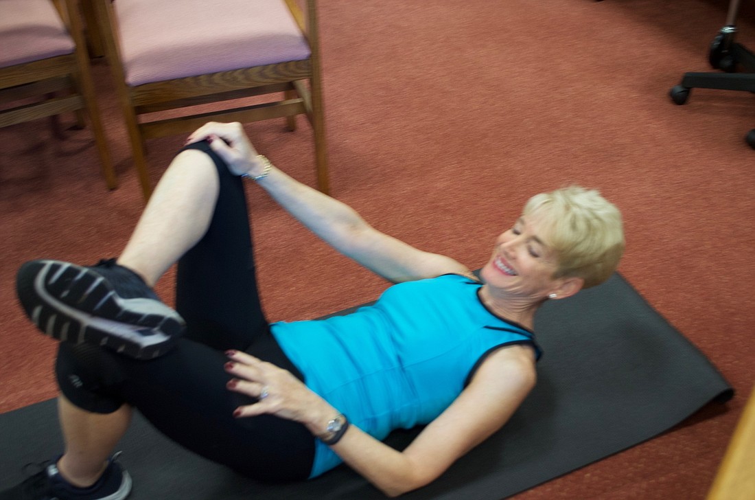Bonnie Wilder demonstrates stretching.