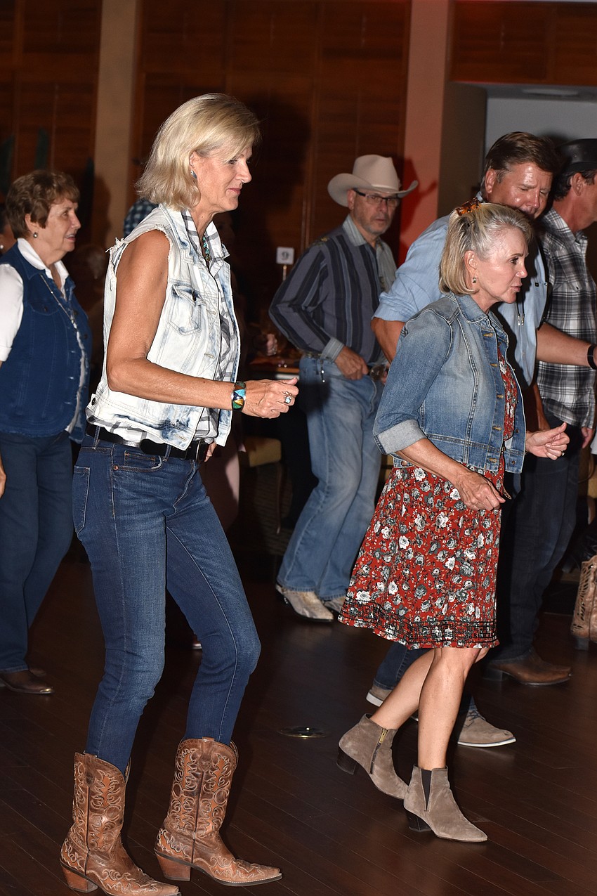 Dancers learn the steps to a line dance for  “Save A Horse (Ride A Cowboy)” by Big & Rich.
