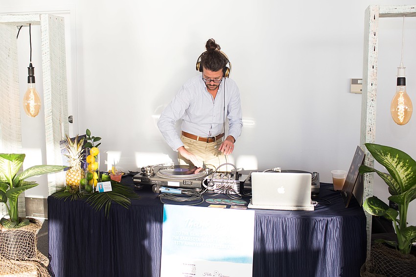 DJ David Curran spins the disk.