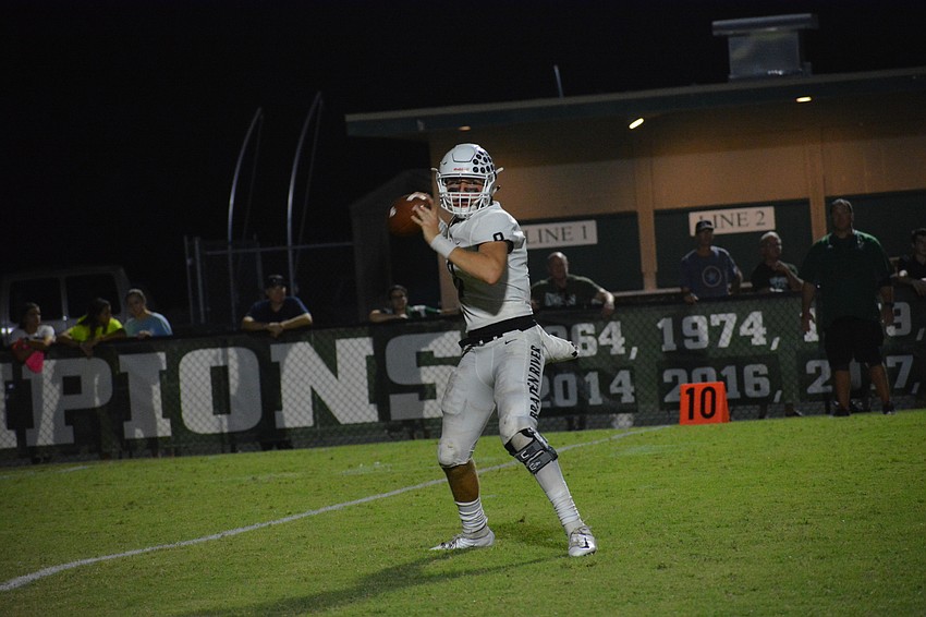 Senior quarterback Bryan Gagg fires a pass in the fourth quarter.