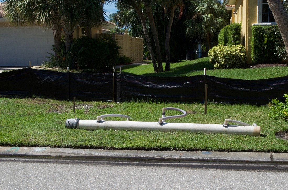 Pipe in a front yard of Binnacle Point Drive