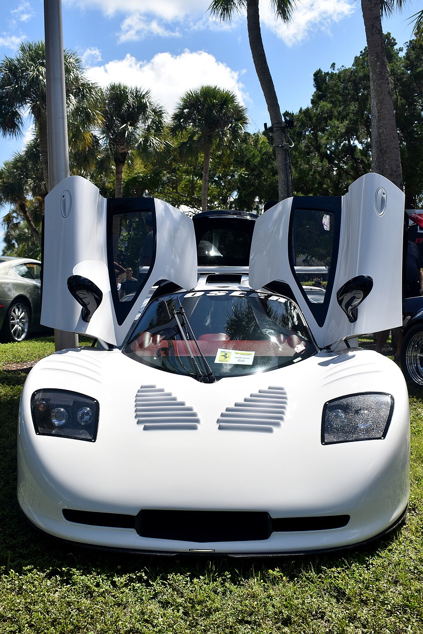 A Mosler My900s sat amongst other exotic cars during the festival.