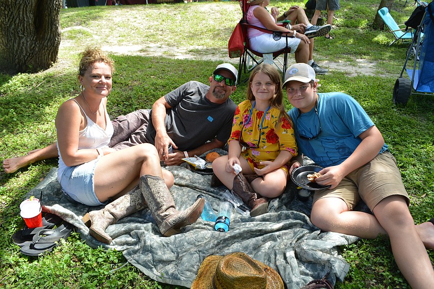 Cortez's Angie Tucker hangs out with Kevin, Lucy and Kaden Armstrong. They kayak the Braden River regularly.