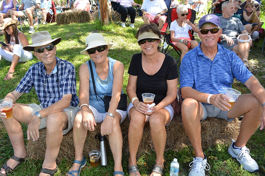 Terry and Barbara Green and Nancy and John Flynn, all of Holmes Beach, escaped the red tide and headed to festivities in East County.