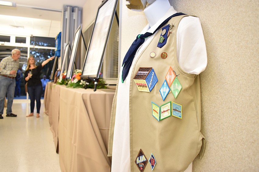 Some guests opted to cool off in an air-conditioned room during cocktail hour where they could learn about the mission (and uniforms) of the Girl Scouts.