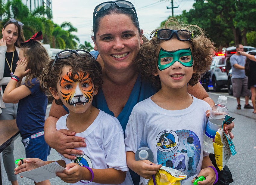 Christian and Tristen Mauricio with their mother, Terah.