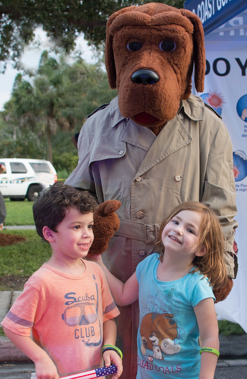 Colton and Adalynn Stauffer with McGruff the Crime Dog.