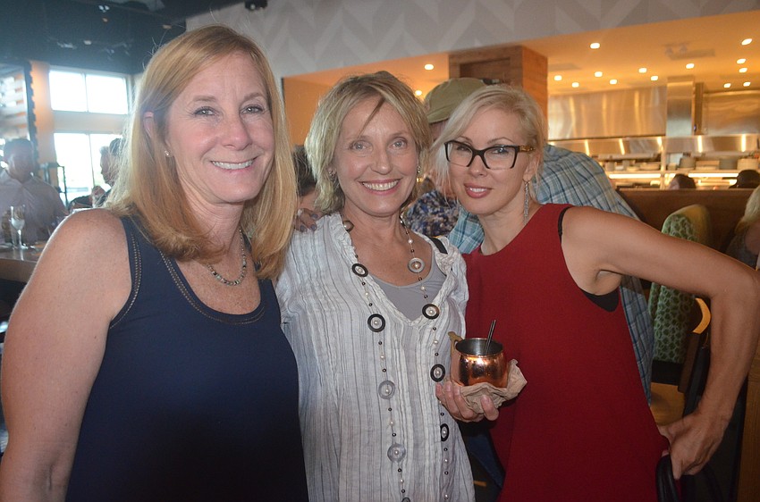 Sisterhood for Good's Kimi Newcomb, new member Tracy Ullman and Sirius Day Spa's Karen Medford say they like Sisterhood for Good because they know they're always giving back to the community.