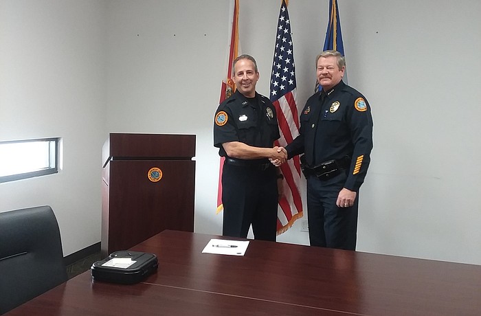 New Longboat police officer John Michael Bobianski with Police Chief Pete Cumming