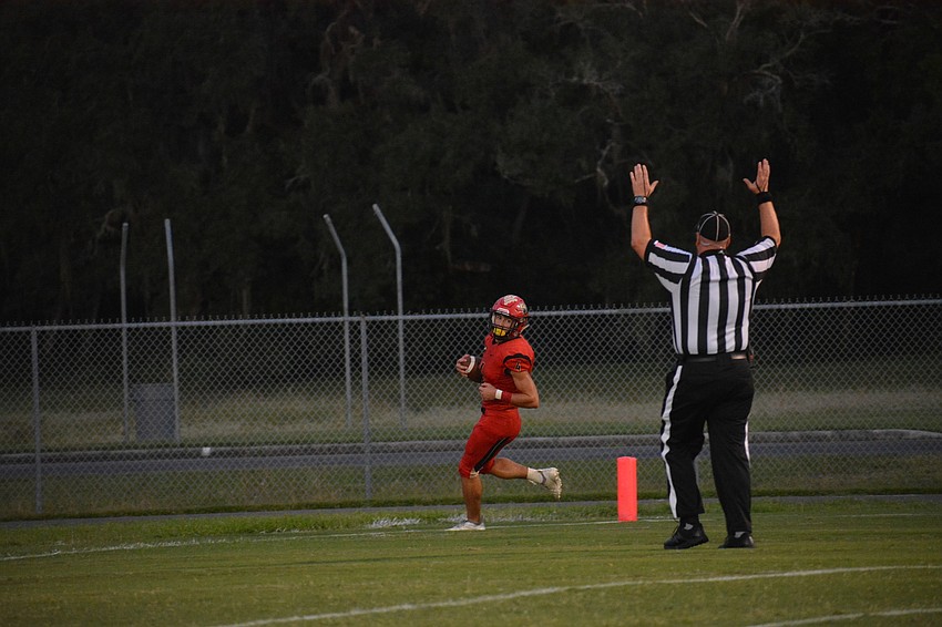 Senior Sam Koscho jogs into the end zone for a touchdown.