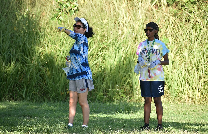 Chloe Manes and Zyanne Miller look out for monofilament.