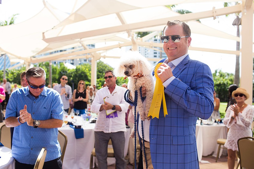 Brian Mariash and Jake pose with Jake's award.