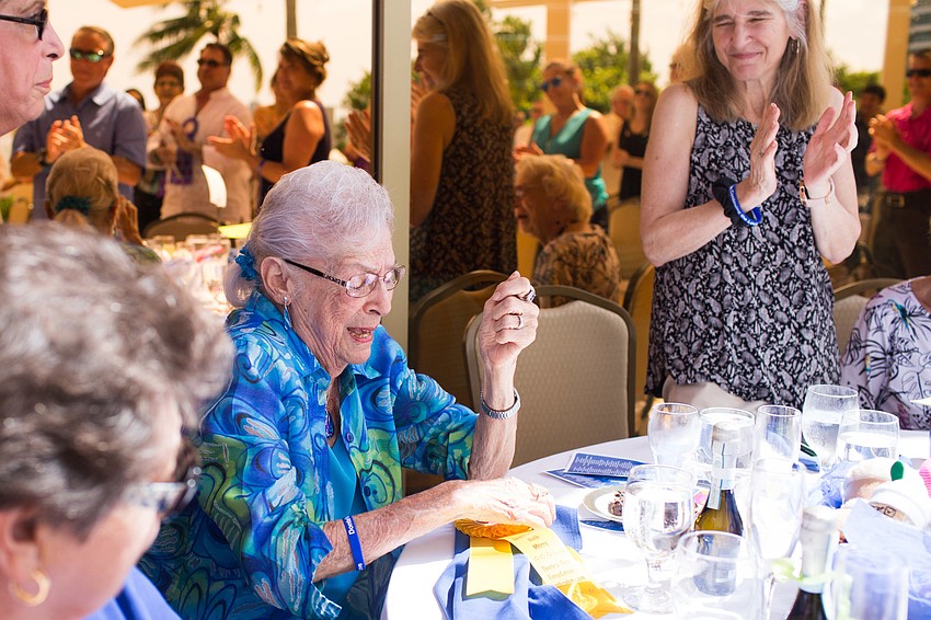 Ruth Merry smiles after receiving a special award from Donte's Den Foundation.