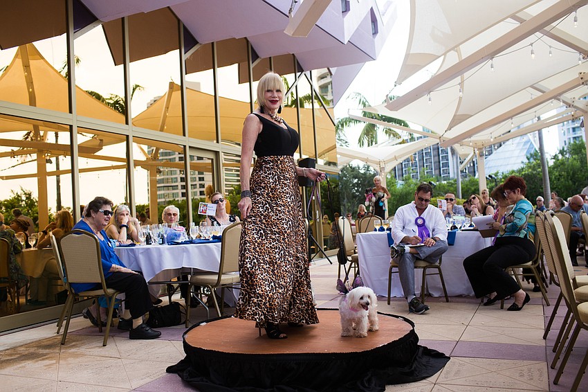 Vicki Hornberger walks with her dog, Bella.