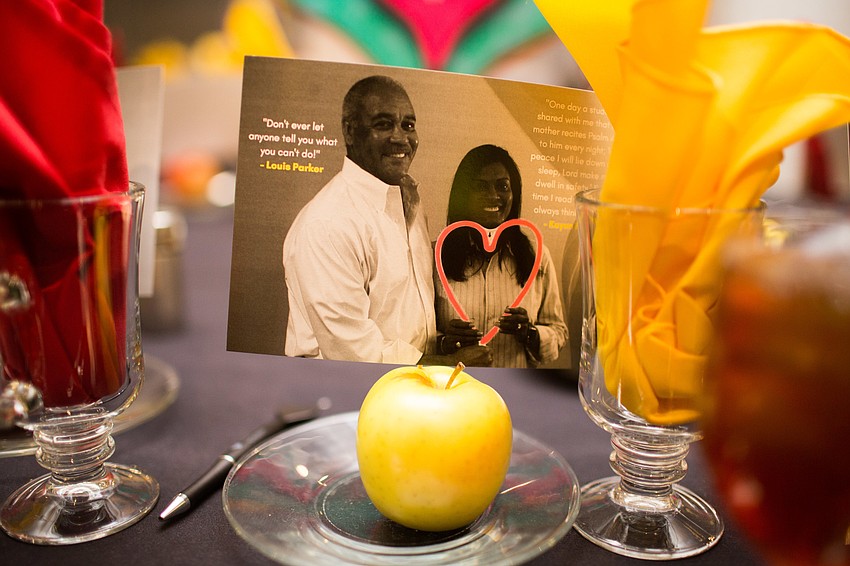 Each place setting had an apple in front of them.