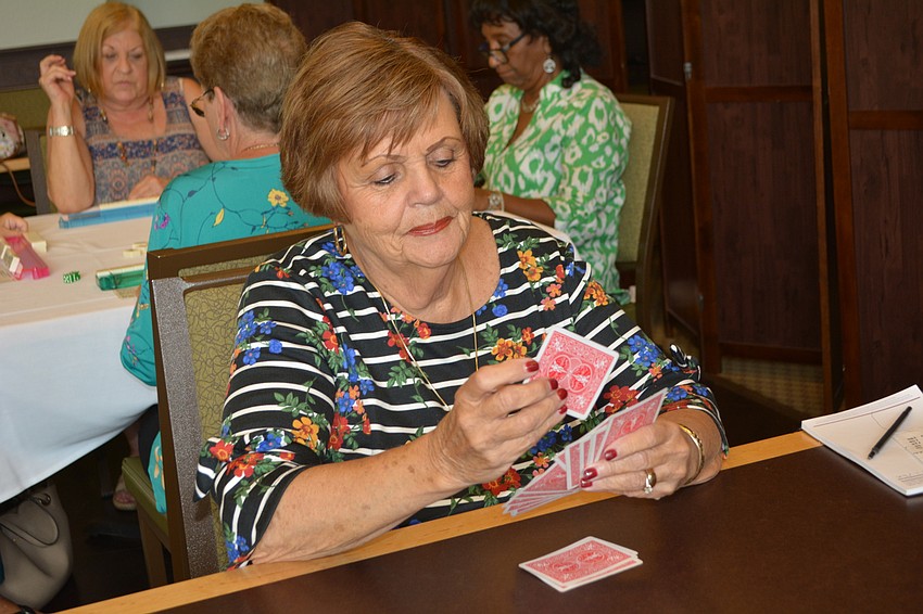Pat Abbotoy plays canasta with friends every Friday.