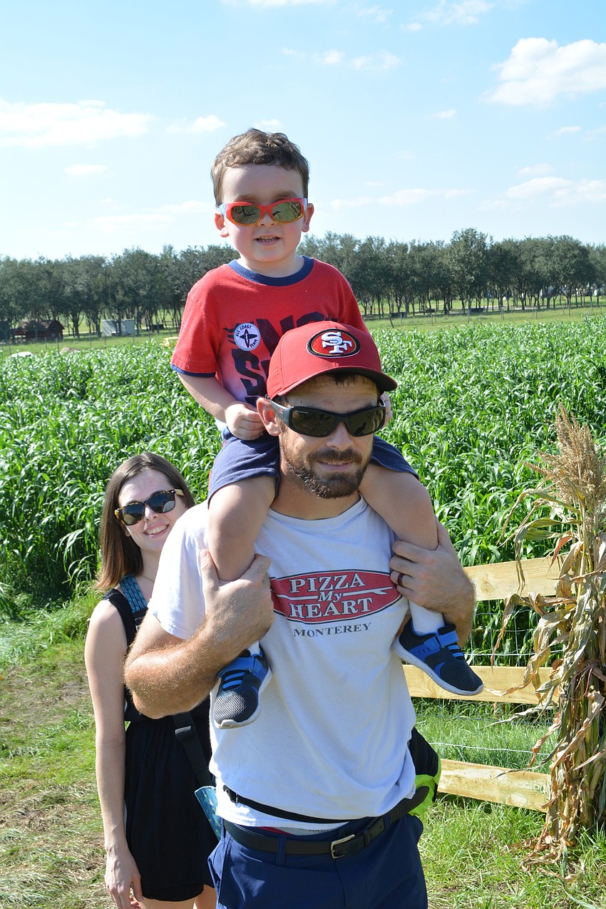 Brooksville's Maranda and Jack Carroll, with their daughter, Marianna, celebrate their 16th wedding anniversary with a trip to the festival Oct. 20.