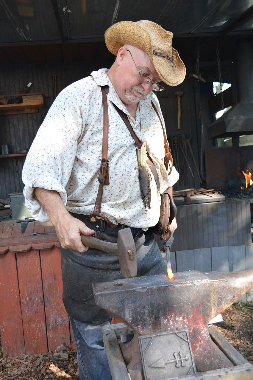 Paul Esterline demonstrates how to forge a dinnerbell.