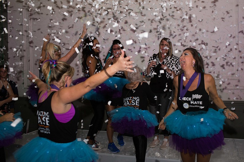 The scavenger hunt winners, Checkmates, celebrate their win.