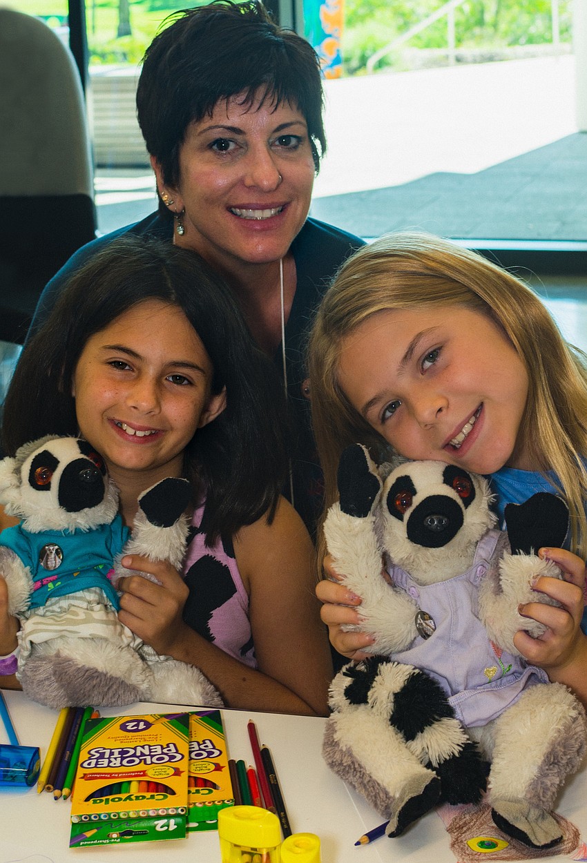 Bay Haven School of Basics Plus students Sydney Hawkins and Hayley Baker with their arts educator Alicia Stein.