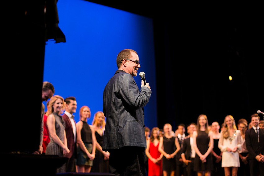 Director Iain Webb tells the audience about the upcoming show.