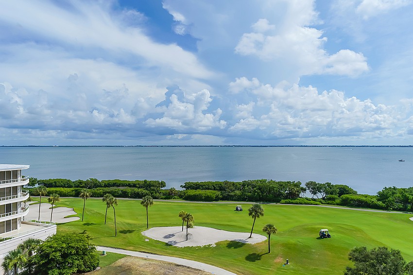 The condominium community overlooks the Harbourside golf course.