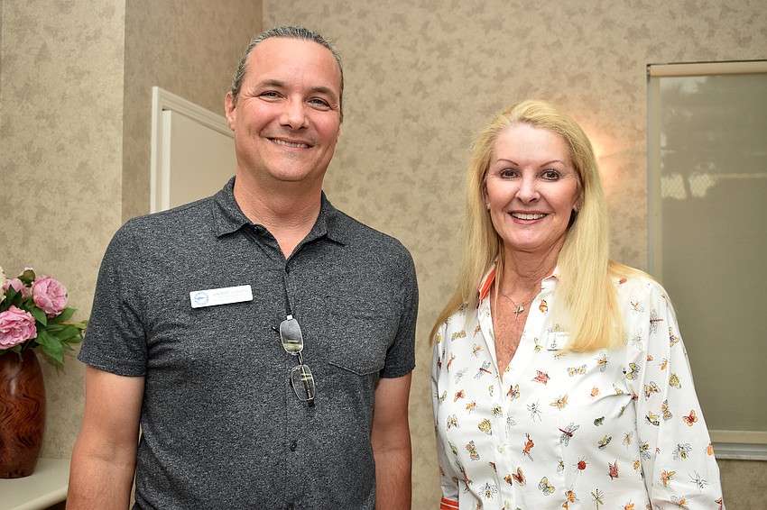 Mote Marine Laboratory Scientist Vincent Lovko and Garden Club President Susan Phillips