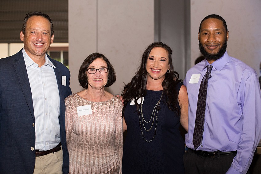 Garry, Marie and Honoree Suzanne Ottomanelli with Vincent Duval