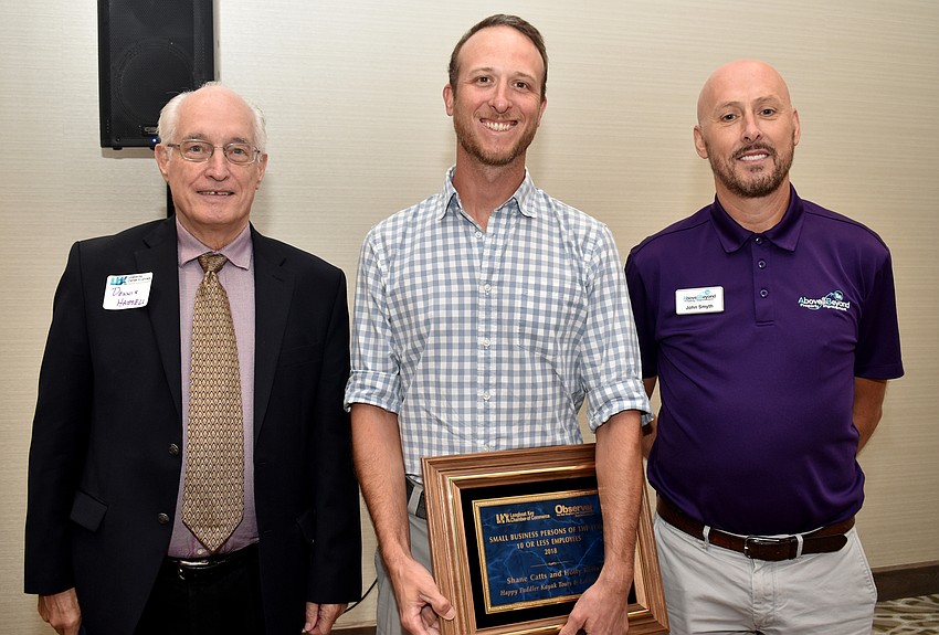 Small Business Person of the Year (10 or less employees) third place winner Dennis Hassel, first place winner Shane Catts and second place winner John Smyth
