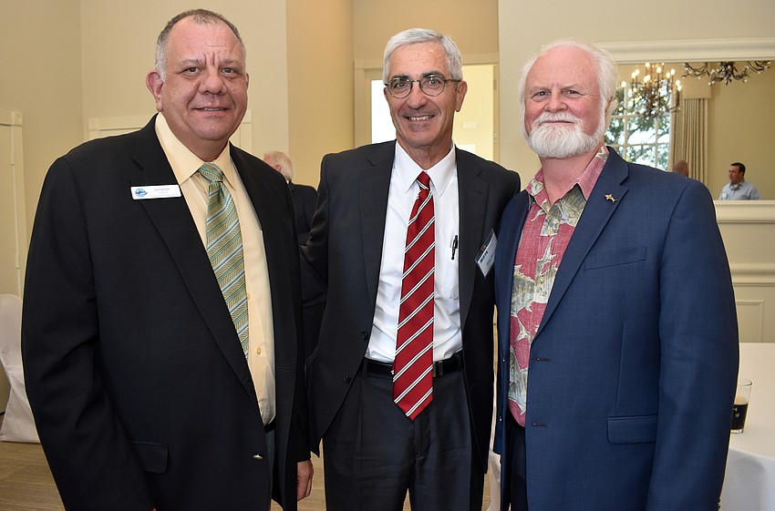 Mote Vice President for Aquarium, Education and Outreach Dan Debak, Rick Piccolo and Mote President and CEO Michael Crosby