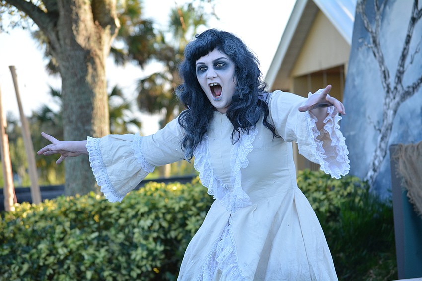 Yvonne Perez, as Woman in White, tells spectators to 