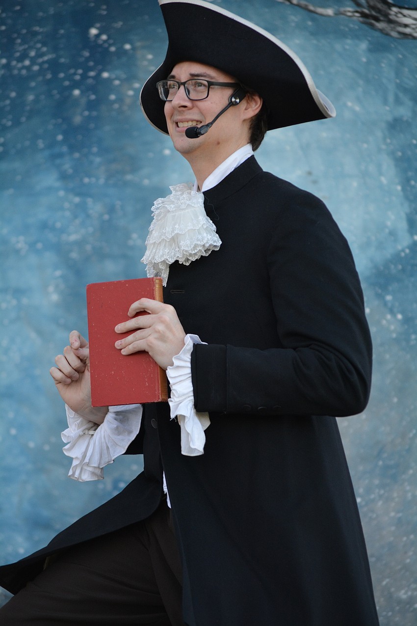 Philip Troyer, as Ichabod Crane, loves to eat and show off his intellect.