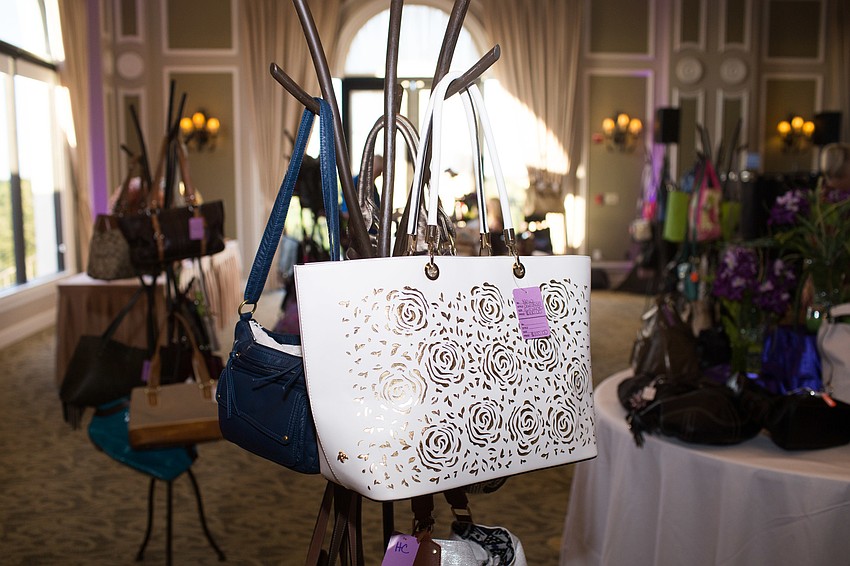 Handbags were on sale for guests to browse.