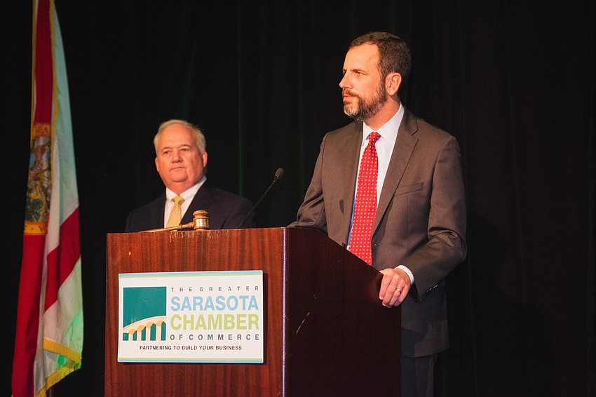 Rob Lane and Charlie Bailey prepare to hand out the Chair's Cup Award.
