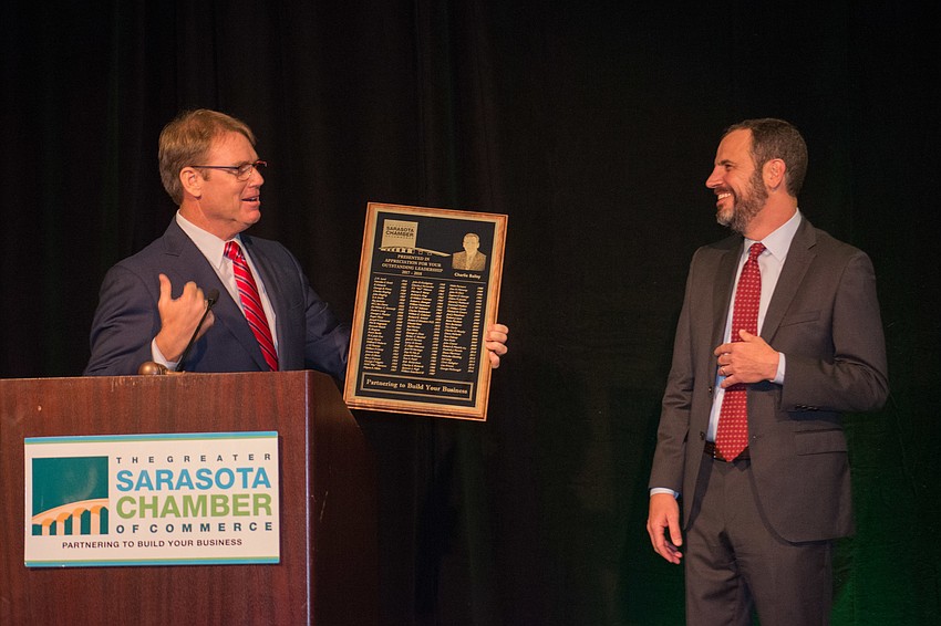 John LaCivita honors outgoing chairman Charlie Bailey.