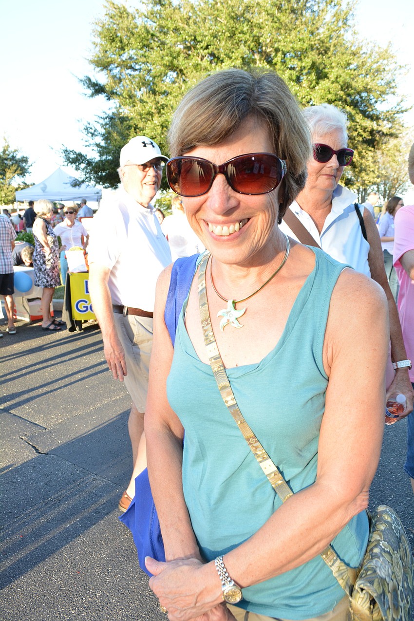 Central Park's Pam Schneider eagerly checks out all the club booths.