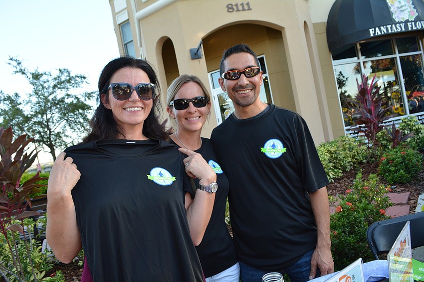 Lakewood Ranch Running Club member Sharon Smyth, Jessica Sandoval and Alex Figuero promote the club's three upcoming races. First up is the Boo Run Oct. 27.