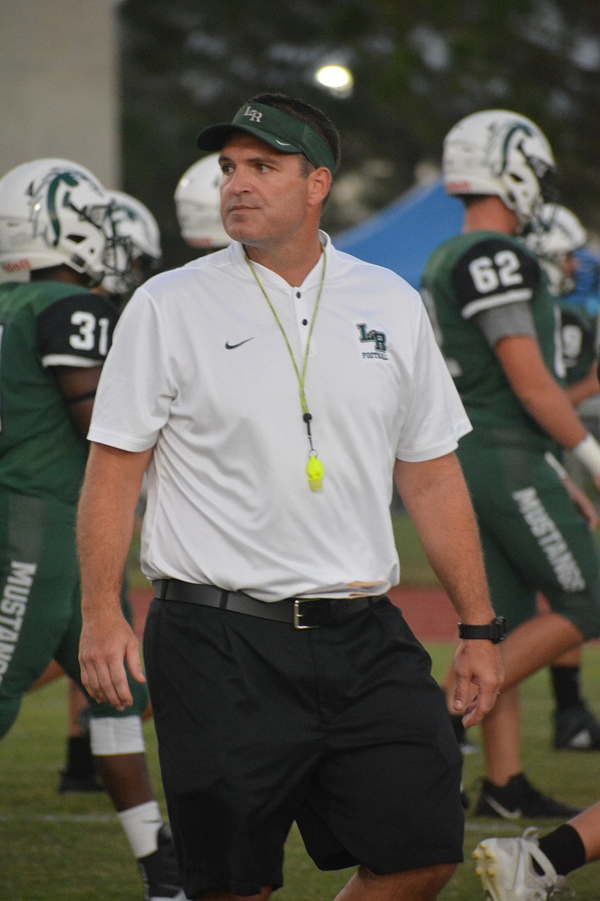 Lakewood Ranch coach Chris Culton prepares for his first taste of the Braden River-Lakewood Ranch rivalry. The Mustangs would lose 56-0.