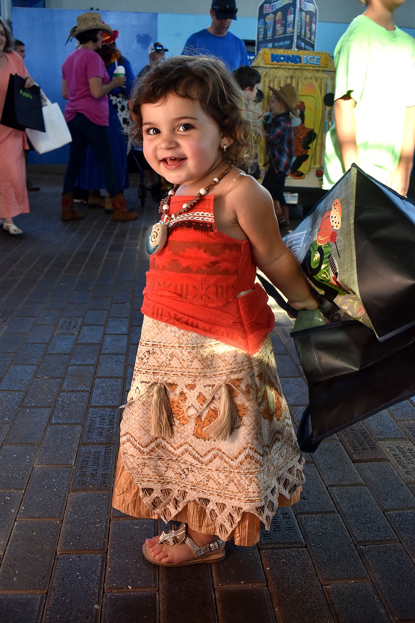 Mia Joerger gets ready to trick or treat at Mote’s Fish, Fun and Fright event.