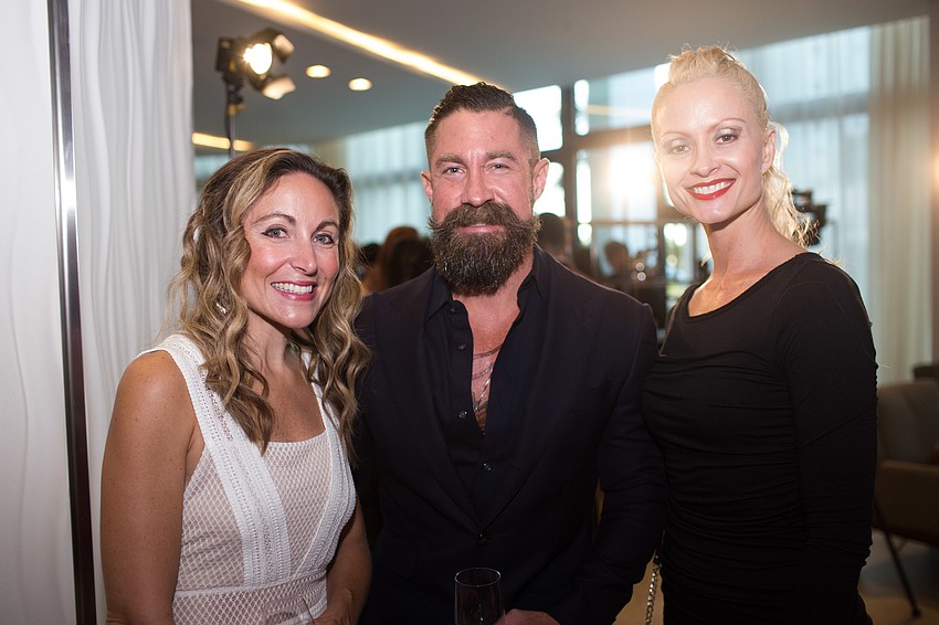 Nicole and Dan Starostecki with Sonia Ragan